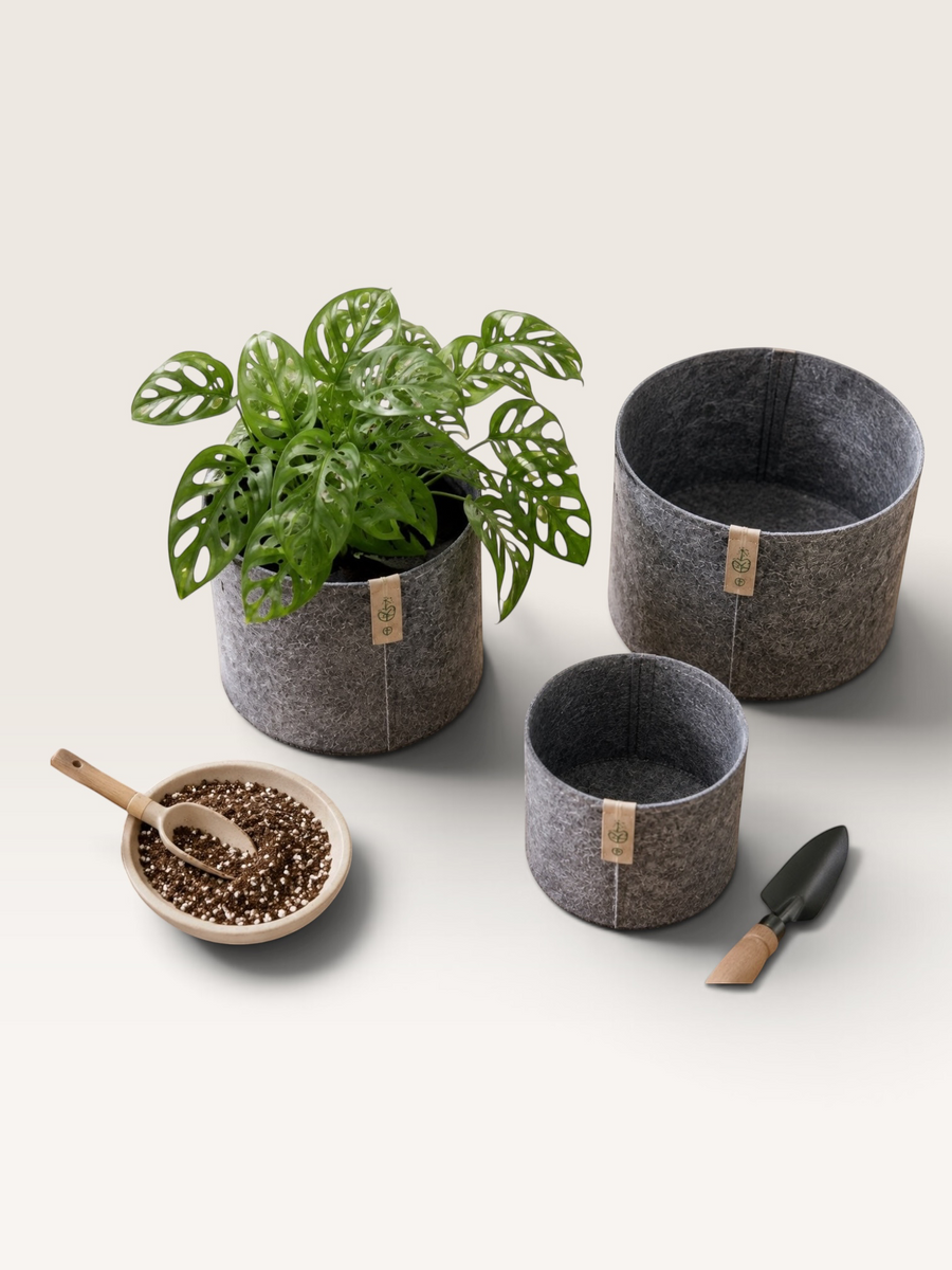 Grauer Filz-Stofftopf von LEAFerservice, atmungsaktiver Pflanzsack aus Stoff für Pflanzen und Garten, nah aufgenommen.